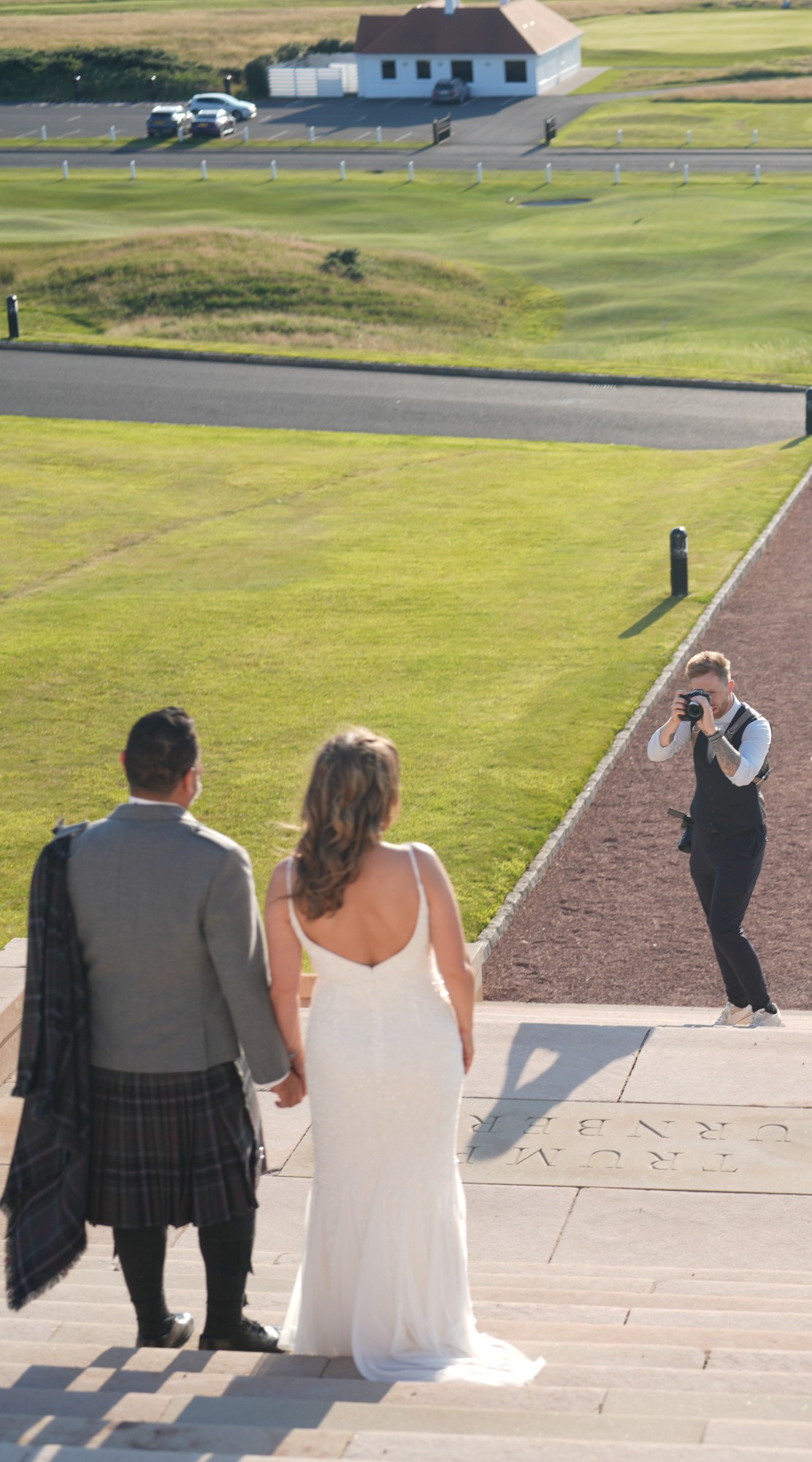 Neill McGlynn photographing at a wedding